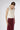 Side view of Bella Cashmere Top Lapponia highlighting structured fit and delicate cable knit detailing.