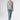 Model wearing Castor Cashmere Pullover Shark styled with tailored trousers for modern minimalist look.