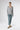 Model wearing Castor Cashmere Pullover Shark styled with tailored trousers for modern minimalist look.