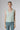 Front view of the Boheme Cashmere Top Salvia in soft sage green highlighting the textured knit, sleeveless silhouette, and elegant scoop neckline.