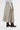 Back view of drizzle grey suede maxi skirt showing fluid drape and structure