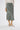 Side view of soft konbu suede midi skirt showing smooth structure and elegant fall