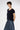Side profile of the Hamlet Cashmere Pullover Beluga revealing its soft structure and flattering relaxed fit.