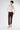 Left side view of Marina Na leather trousers in Shiraz highlighting smooth leather texture
