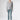 Front view of the Napoli VE Suede Trousers Capri in soft sage tone, highlighting the flattering slim fit and elegant cropped length.